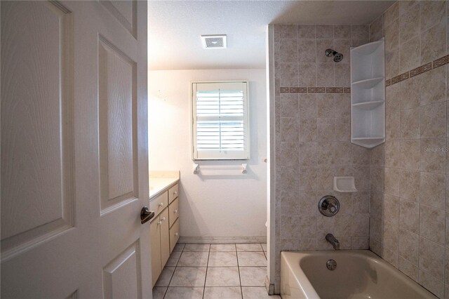 23101 Hillsdale Ave, Port Charlotte, FL 33954 - bathroom featuring tile patterned flooring, vanity, shower / tub combination, and baseboards