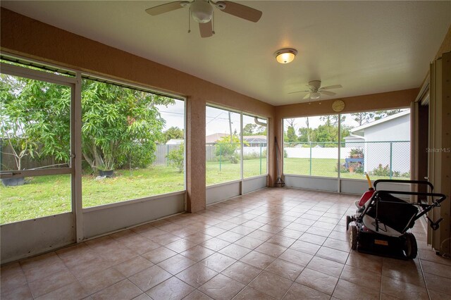 23101 Hillsdale Ave, Port Charlotte, FL 33954 - sunroom featuring ceiling fan