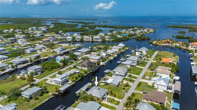 24261 Captain Kidd Blvd, Punta Gorda, FL 33955 - aerial view of property and surrounding area with a large body of water and nearby suburban area