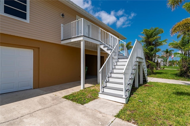 24261 Captain Kidd Blvd, Punta Gorda, FL 33955 - view of home's exterior featuring a yard, stairs, and stucco siding