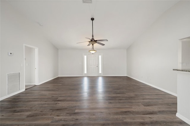 24261 Captain Kidd Blvd, Punta Gorda, FL 33955 - unfurnished living room featuring ceiling fan, dark wood-style floors, and lofted ceiling