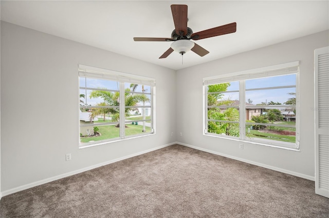 24261 Captain Kidd Blvd, Punta Gorda, FL 33955 - empty room featuring carpet, healthy amount of natural light, and ceiling fan