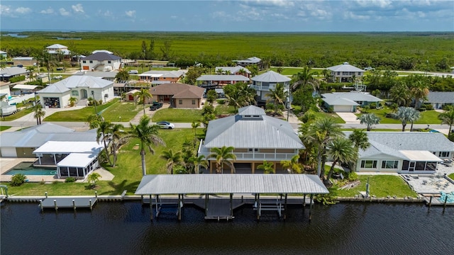 24261 Captain Kidd Blvd, Punta Gorda, FL 33955 - aerial perspective of suburban area with a heavily wooded area and a large body of water