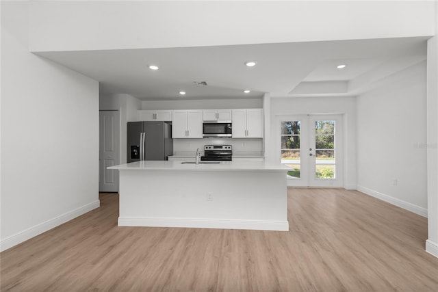 20379 Reston Ave, Port Charlotte, FL 33954 - kitchen featuring appliances with stainless steel finishes, baseboards, light wood-style floors, light countertops, and recessed lighting