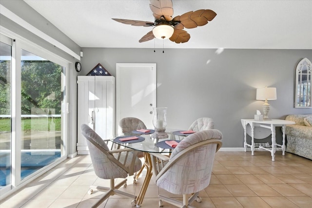 6382 Cutler Ter, Port Charlotte, FL 33981 - dining area with light tile patterned floors and a ceiling fan