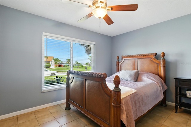 6382 Cutler Ter, Port Charlotte, FL 33981 - bedroom featuring multiple windows, light tile patterned floors, and a ceiling fan