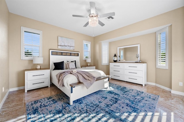 3322 Sandpiper Dr, Punta Gorda, FL 33950 - tiled bedroom featuring baseboards and a ceiling fan