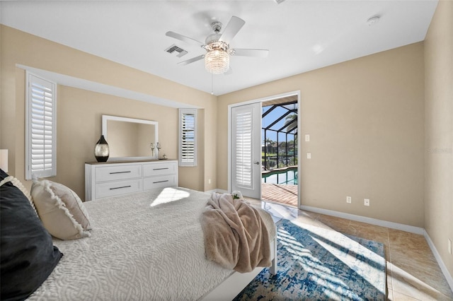 3322 Sandpiper Dr, Punta Gorda, FL 33950 - bedroom with access to outside, tile patterned flooring, and a ceiling fan