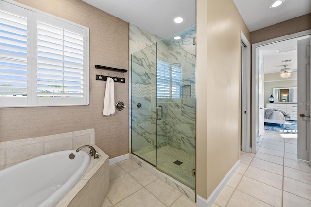 3322 Sandpiper Dr, Punta Gorda, FL 33950 - ensuite bathroom featuring a garden tub, a marble finish shower, tile patterned flooring, and recessed lighting
