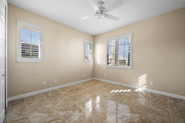 3322 Sandpiper Dr, Punta Gorda, FL 33950 - spare room with a ceiling fan and baseboards