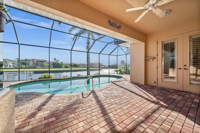 3322 Sandpiper Dr, Punta Gorda, FL 33950 - swimming pool with a patio area, ceiling fan, a water view, and glass enclosure