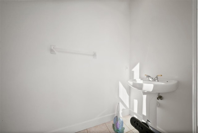 3322 Sandpiper Dr, Punta Gorda, FL 33950 - bathroom with tile patterned floors and baseboards