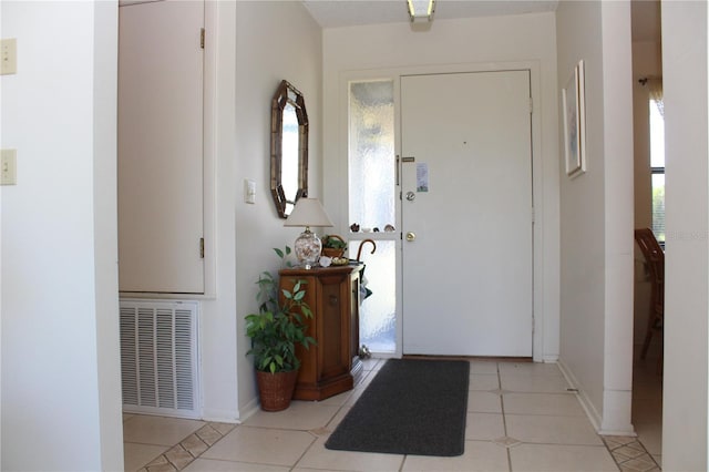 2467 Herron Ter, Port Charlotte, FL 33981 - foyer featuring light tile patterned floors and baseboards