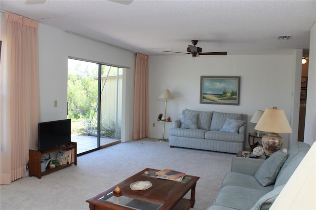 2467 Herron Ter, Port Charlotte, FL 33981 - living room featuring carpet floors and a ceiling fan