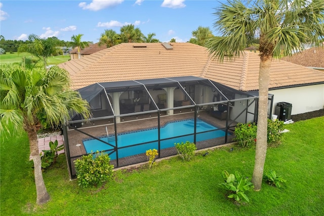 1141 Paraclete Rd, Punta Gorda, FL 33983 - outdoor pool with a patio, a lawn, and a lanai