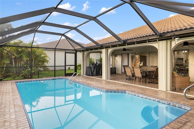 1141 Paraclete Rd, Punta Gorda, FL 33983 - outdoor pool featuring a ceiling fan, outdoor dining space, and a patio area