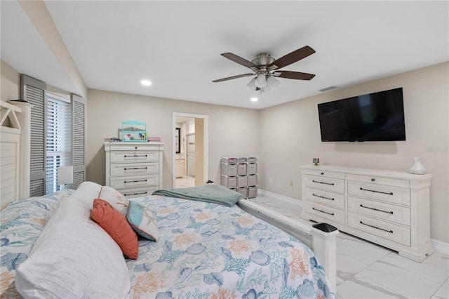 1141 Paraclete Rd, Punta Gorda, FL 33983 - bedroom featuring light marble finish floors, recessed lighting, ensuite bath, and ceiling fan