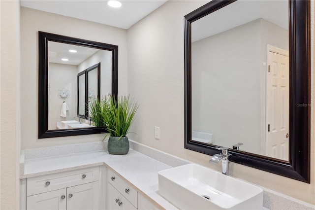 1141 Paraclete Rd, Punta Gorda, FL 33983 - bathroom with vanity and recessed lighting