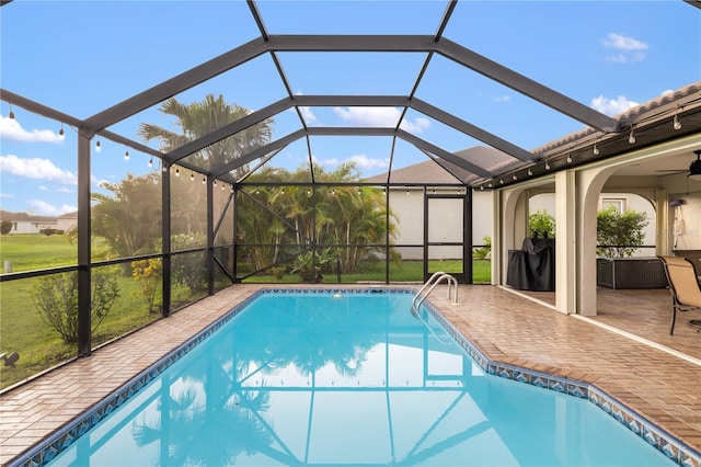 1141 Paraclete Rd, Punta Gorda, FL 33983 - swimming pool featuring a patio area, ceiling fan, and grilling area