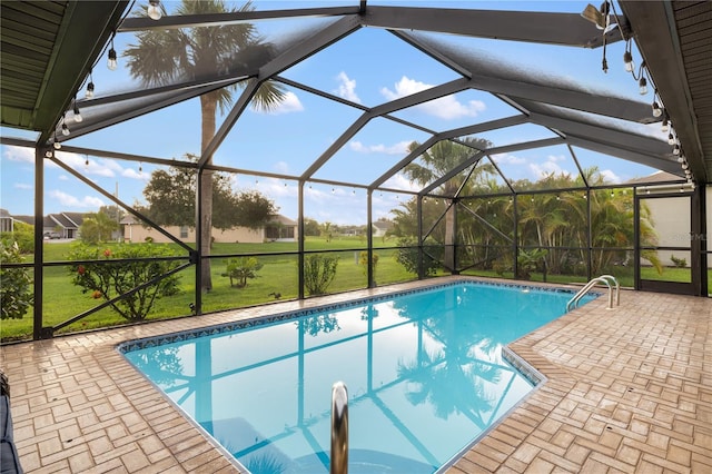 1141 Paraclete Rd, Punta Gorda, FL 33983 - outdoor pool with glass enclosure, a patio, and a lawn