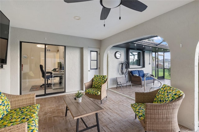 1141 Paraclete Rd, Punta Gorda, FL 33983 - sunroom / solarium featuring a ceiling fan and arched walkways