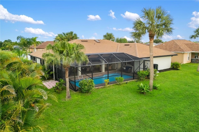 1141 Paraclete Rd, Punta Gorda, FL 33983 - outdoor pool featuring a lawn, a patio, and glass enclosure