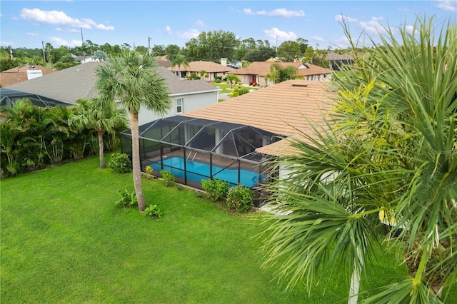 1141 Paraclete Rd, Punta Gorda, FL 33983 - outdoor pool featuring a yard, a residential view, and a lanai