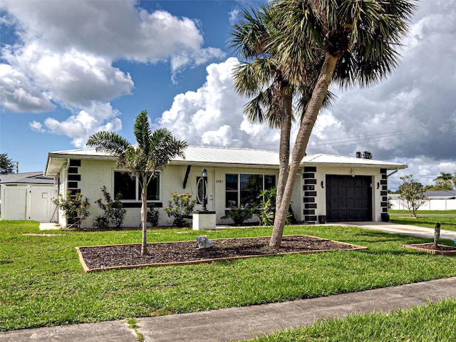 6483 Fabian Rd, North Port, FL 34287 - ranch-style house with an attached garage, concrete driveway, and brick siding