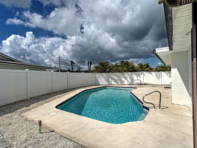 6483 Fabian Rd, North Port, FL 34287 - view of swimming pool with a fenced backyard and a patio area