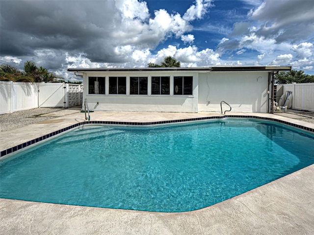 6483 Fabian Rd, North Port, FL 34287 - view of pool featuring a gate, a fenced backyard, and a patio