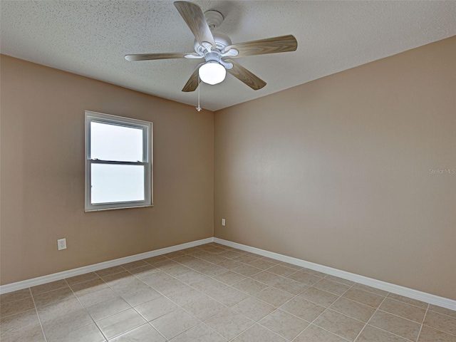 6483 Fabian Rd, North Port, FL 34287 - unfurnished room with light tile patterned flooring, a textured ceiling, and ceiling fan