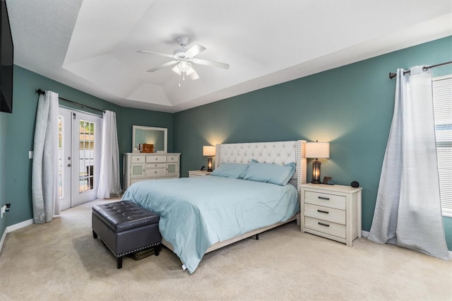 2373 Chartwell Ave, North Port, FL 34288 - bedroom with access to exterior, a raised ceiling, carpet flooring, and ceiling fan
