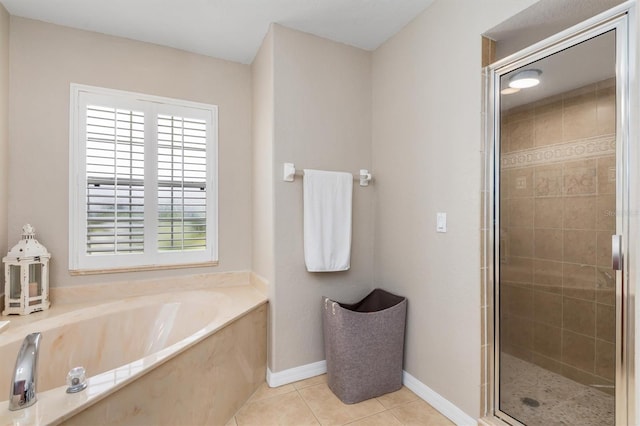 2373 Chartwell Ave, North Port, FL 34288 - bathroom featuring a garden tub, a stall shower, and tile patterned flooring
