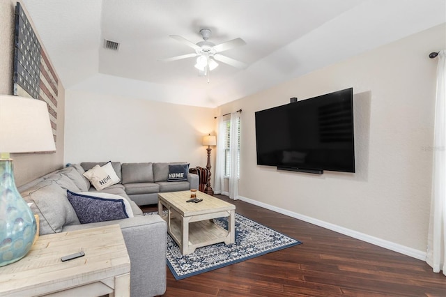 2373 Chartwell Ave, North Port, FL 34288 - living room featuring wood finished floors, a ceiling fan, and a tray ceiling