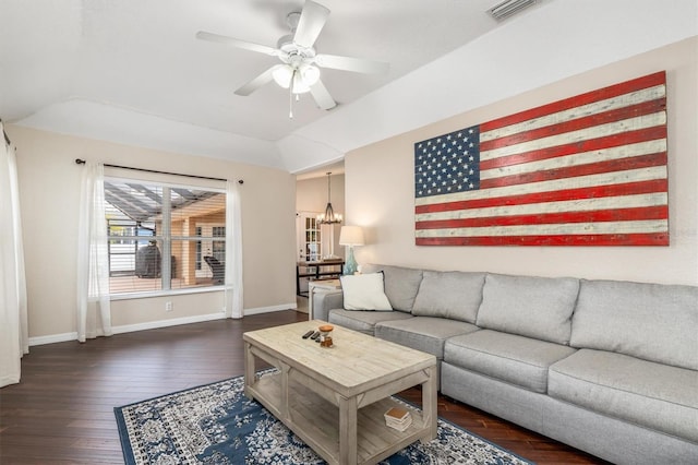 2373 Chartwell Ave, North Port, FL 34288 - living room featuring dark wood-style floors, a ceiling fan, and a chandelier