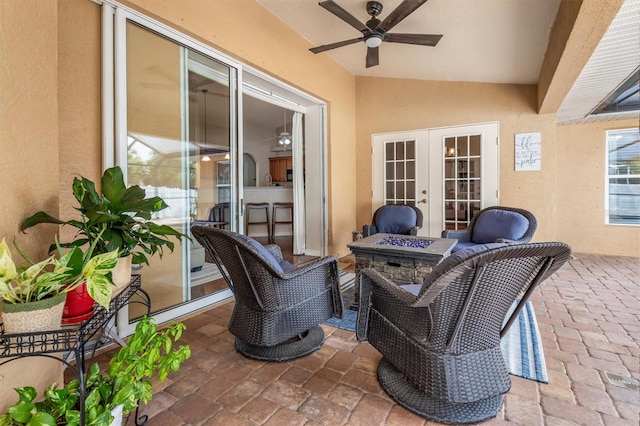 2373 Chartwell Ave, North Port, FL 34288 - view of patio / terrace with french doors, ceiling fan, and an outdoor fire pit