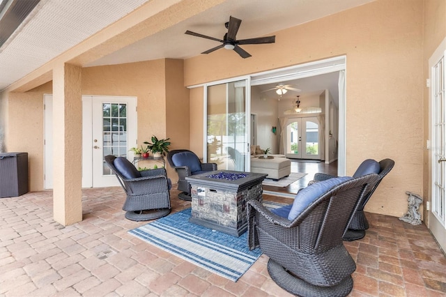 2373 Chartwell Ave, North Port, FL 34288 - view of patio featuring french doors, an outdoor fire pit, and ceiling fan
