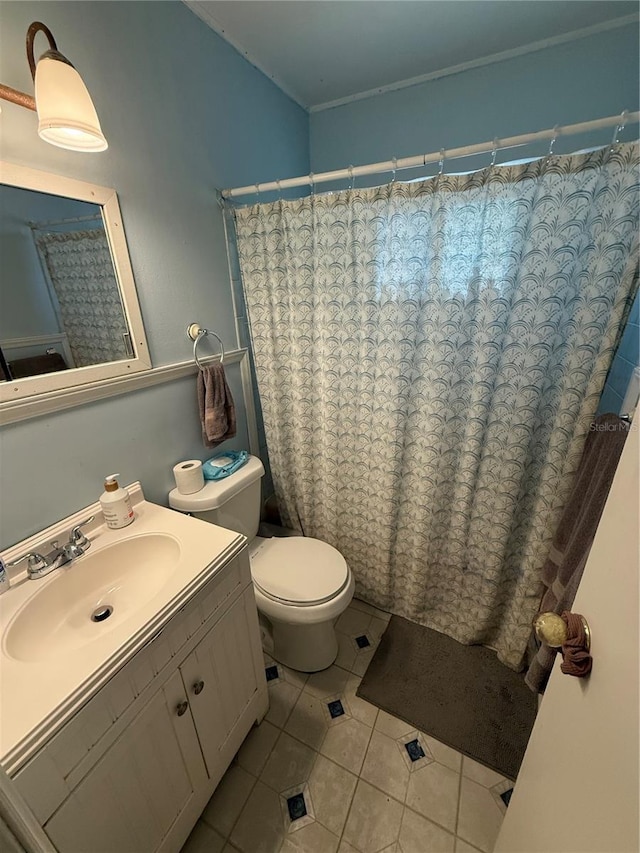 2174 Schwalbe Way, Sarasota, FL 34235 - full bath featuring toilet, tile patterned flooring, vanity, and curtained shower