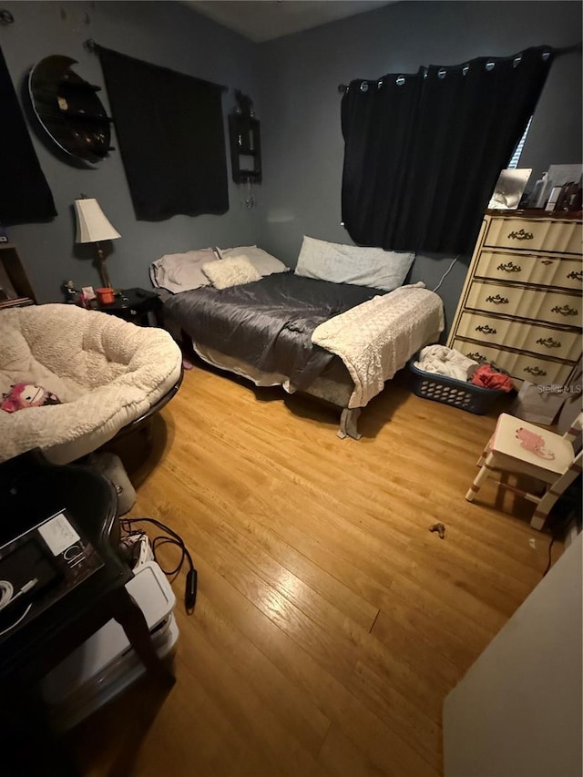 2174 Schwalbe Way, Sarasota, FL 34235 - bedroom with wood finished floors