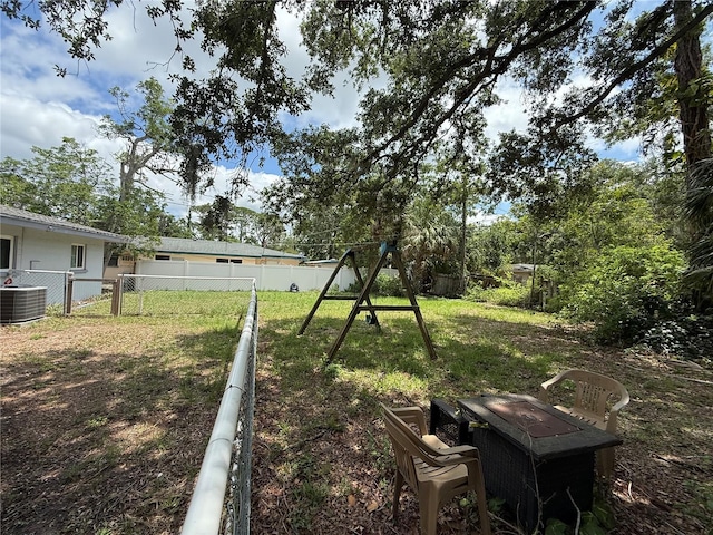 2174 Schwalbe Way, Sarasota, FL 34235 - view of yard with central AC unit