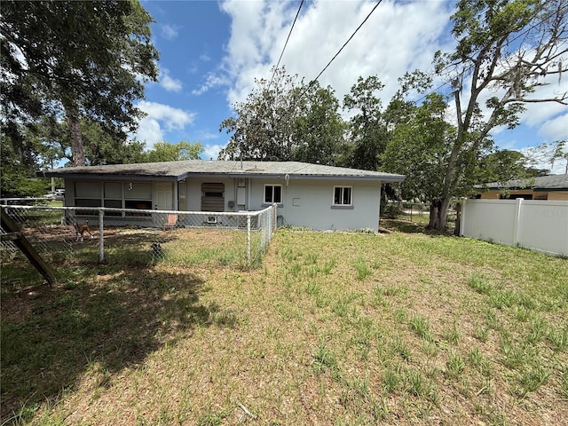 2174 Schwalbe Way, Sarasota, FL 34235 - back of house with stucco siding
