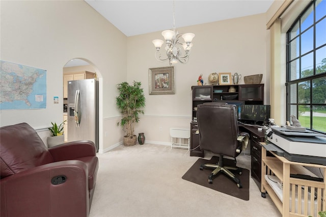 167 Marker Rd, Rotonda West, FL 33947 - office space with a chandelier, carpet floors, lofted ceiling, and arched walkways