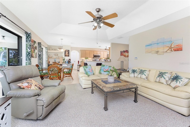 167 Marker Rd, Rotonda West, FL 33947 - living area featuring a ceiling fan and a tray ceiling