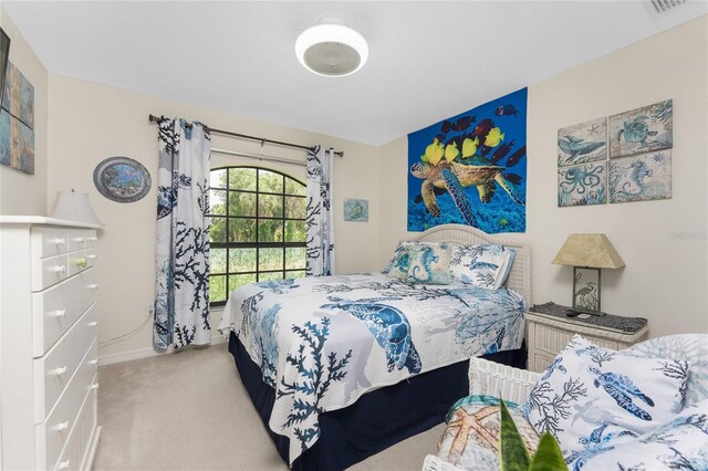167 Marker Rd, Rotonda West, FL 33947 - bedroom with light carpet and baseboards