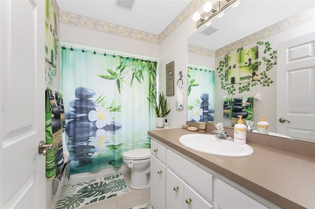 167 Marker Rd, Rotonda West, FL 33947 - full bath featuring vanity, tile patterned floors, and a shower with curtain