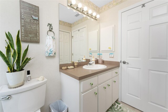 167 Marker Rd, Rotonda West, FL 33947 - bathroom featuring toilet and vanity