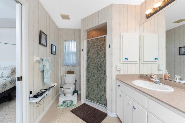 167 Marker Rd, Rotonda West, FL 33947 - ensuite bathroom featuring a stall shower, tile patterned flooring, and vanity