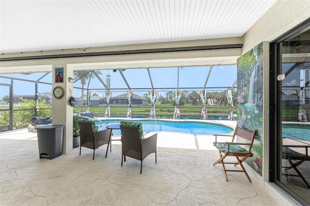 167 Marker Rd, Rotonda West, FL 33947 - outdoor pool featuring glass enclosure and a patio