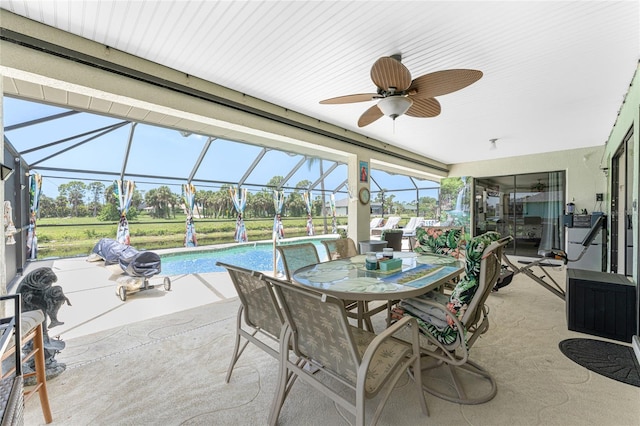 167 Marker Rd, Rotonda West, FL 33947 - sunroom featuring ceiling fan and outdoor dining area