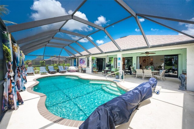 167 Marker Rd, Rotonda West, FL 33947 - outdoor pool with an outdoor hangout area, a patio area, a ceiling fan, and a lanai